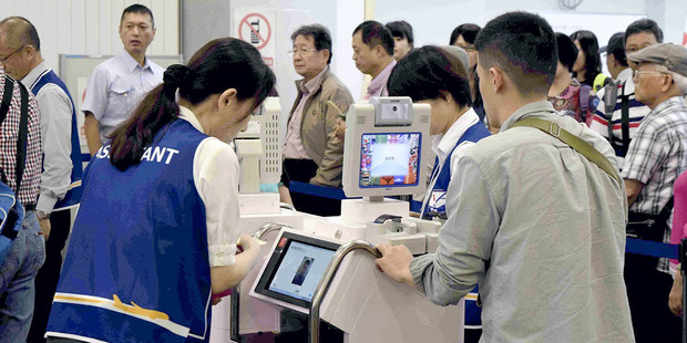 Foreign visitors use biocarts for entry procedures at Takamatsu Airport in October. Photo / The Japan News-Yomiuri