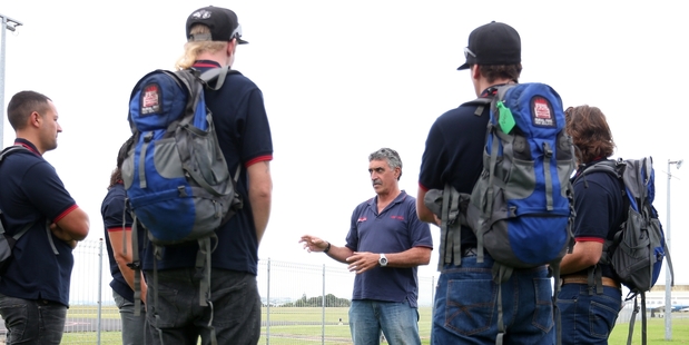 KIWI CREW: Kevin Ihaka of Forest Protection Services briefed the Whangarei crew at Whangarei Airport before they flew off to Tasmania yesterday. PHOTOS/MICHAEL CUNNINGHAM