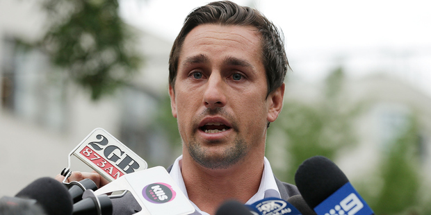 A tearful Mitchell Pearce apologizes for his drunken antics with a dog. Photo / Getty