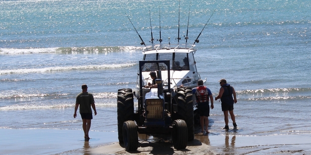 Fishermen put to sea at Akitio after using the operational launch ramp on Sunday.