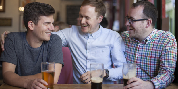 Male bonding is more likely to lower a man's stress levels than if he were to spend an evening with his partner. Photo / Getty