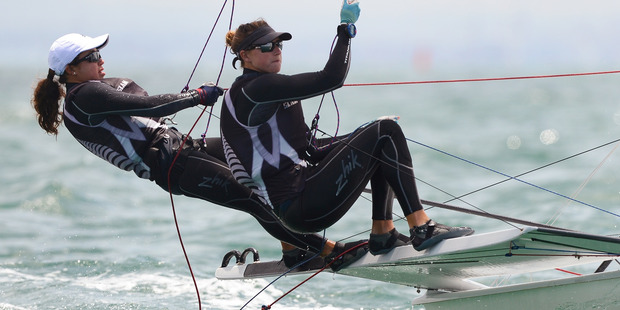 Alex Maloney and Molly Meech of New Zealand sail through the waves in the 49er FX class. Photo / Getty Images