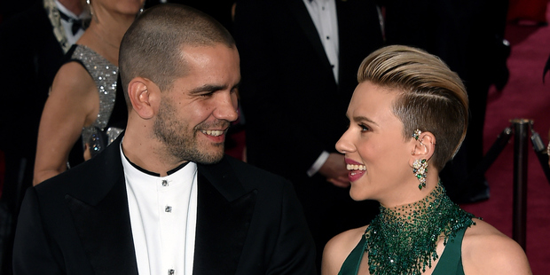 Johansson with her journalist husband Romain Dauriac at last year's Oscars. Photo / Getty Images