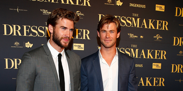 Chris Hemsworth (right) denies any knowledge of brother Liam's (left) rumoured engagement to Miley Cyrus. Photo / Getty