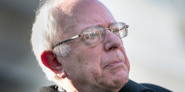 Democratic presidential candidate Bernie Sanders speaks to reporters after a meeting with US President Barack Obama at the White House. Photo / AFP / Brendan Smialowski