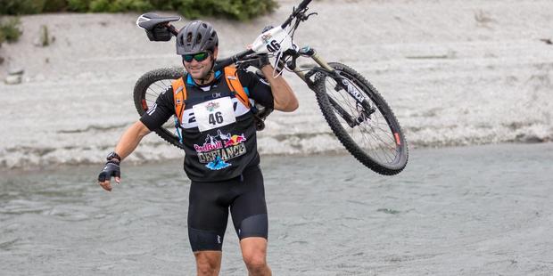 Richie McCaw completed the initial mountain bike stage of the Red Bull Defiance multisport event as part of his training for GODZone event in April. Photo / Supplied