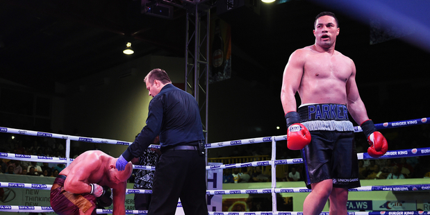 New Zealand Heavyweight boxer Joseph Parker knocks down American Southpaw Jason Bergman during the Rumble in Paradise. Photo / Photosport.co.nz