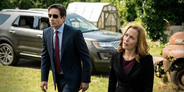David Duchovny as Fox Mulder and Gillian Anderson as Dana Scully in the The X-Files.