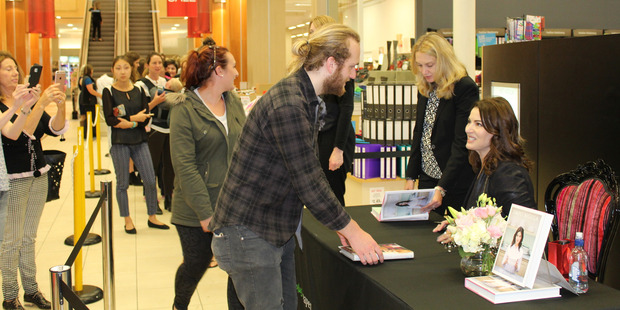 Nigella Lawson signed cookbooks for fans at the H&J Smith store in Invercargill yesterday afternoon before the gala dinner last night. Photo / Otago Daily Times