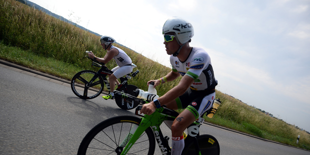 As you head back into work, review your objectives and your team's - are they making you uncomfortable? Or are you self-limiting your performance? Photo / Frederik Van Lierde (R) of Belgium during the bike section of Ironman European Championships Frankfurt Photo by Nigel Roddis/Getty Images for Ironman)