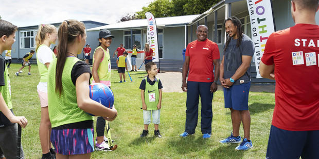 New Youthtown Ambassador Tana Umaga meeting children at a Breakaway school holiday programme at Rosehill College, Papakura, last week. Photo / Nic Fletcher