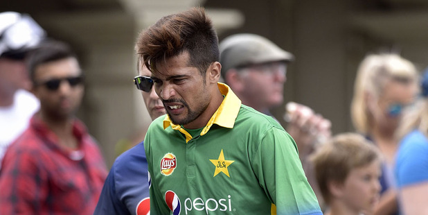 Mohammad Amir leaves the field injured during the opening ODI at the Basin Reserve. Photo / Getty