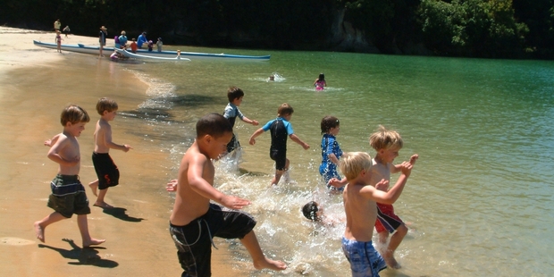 In Riwaka kids can enjoy swimming, fishing and finding their own fun. Photo / Elisabeth Easther