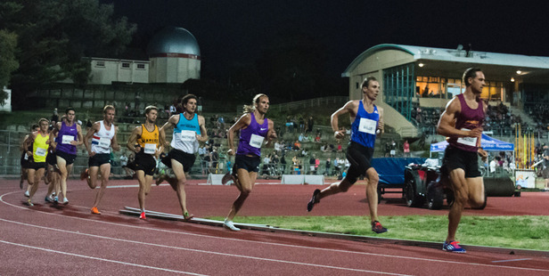 Nick Willis, in second, on his way to completing another sub-four minute mile in Whanganui. Photo / Michael Dawson