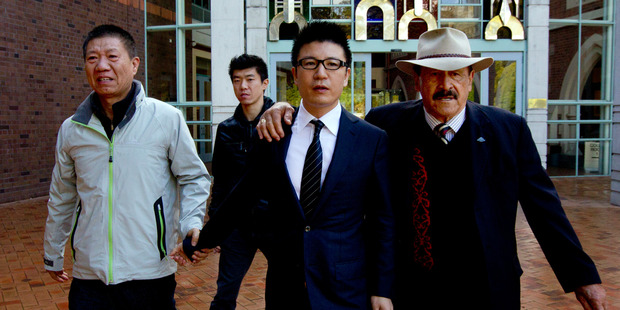 William Yan with his close friend Dover Samuels, a former Labour MP, after he was found not guilty of immigration and citizenship charges. Photo / Brett Phibbs.
