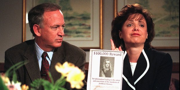 John and Patsy Ramsey holding a reward poster for their murdered daughter, JonBenet Ramsey. Photo / AP