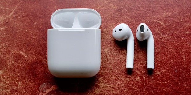 Apple AirPods with the charging case. Photo / Juha Saarinen
