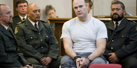 Graeme Burton sitting in a wheelchair during his sentencing in the High Court at Wellington. 3 April 2007 New Zealand Herald Photograph by Mark Mitchell