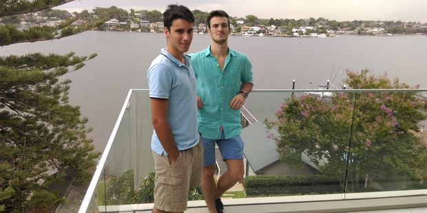 Nick Panayiotou (left) 17, and his friend Daniel Dudman, 18, were filming a thunderstorm brewing at Sydney's Oyster Bay on Saturday. Photo / Supplied