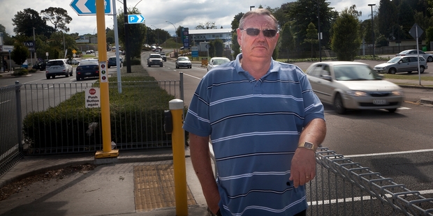 Paul Gregory wants road authorities to remedy the pedestrian traffic signals through the shopping centre so over-sized truck loads can go straight through. Photo / Andrew Warner
