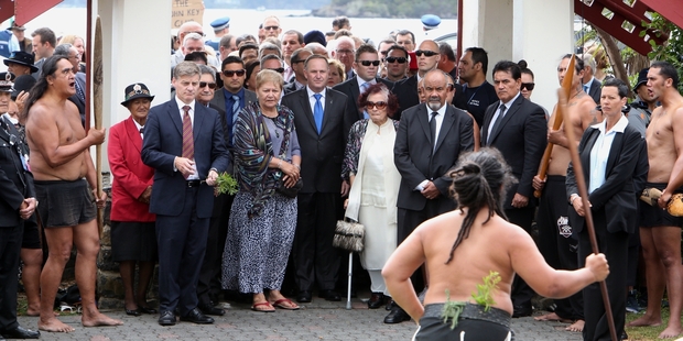 Prime Minister John Key is escorted on to Te Tii marae ahead of last year's Waitangi Day celebrations by Titewhai Harawira. This year he may not be welcomed on after a hui of Ngapuhi voted to ban him from the marae. Photo / John Stone
