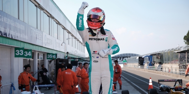 Nick Cassidy celebrates after winning the Japanese F3 championship last year.