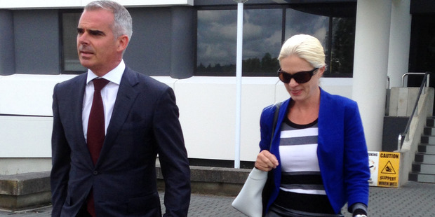 Tessa Fiona Grant leaves the Hamilton District Court with her lawyer Guyon Foley. Photo / Belinda Feek