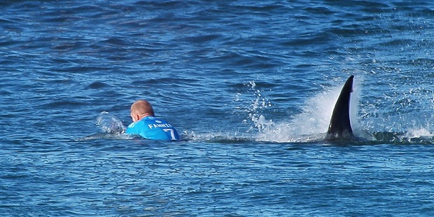 Fanning is attacked by a shark during a surf contest last year. Photo / Getty Images