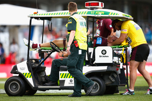 Jake Trbojevic is taken off the field on a stretcher following a hit-up from Konrad Hurrell. Photo / Getty