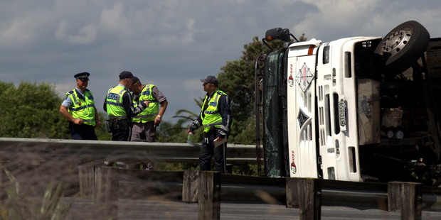 The truck rolled blocking the Takanini northbound on-ramp. Photo / Dean Purcell