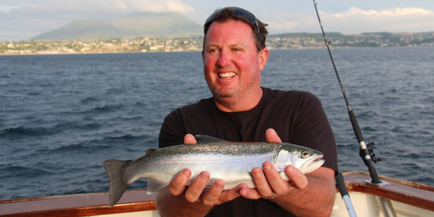 Mike Baker caught his first trout while fishing on Lake Taupo. Photo / Geoff Thomas