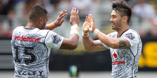 Shaun Johnson celebrates after scoring against the Bulldogs. Photo / Brett Phibbs