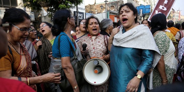 Women calling for harsher penalties for sex criminals clashed with police outside court during the trial. Photo / AP