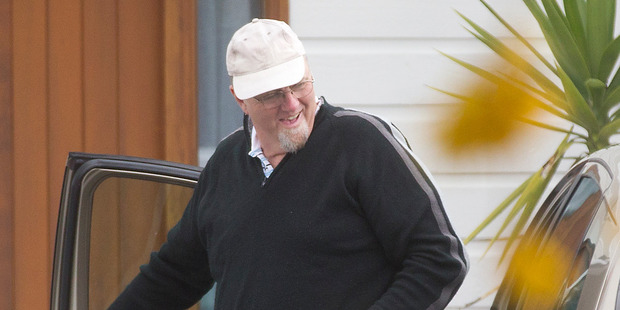 Mark Lundy returns to his house he has been bailed to in Taupo after a shopping trip. Photo / Christine Cornege