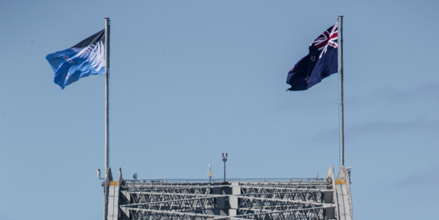 The cost to replace the potential new flag waving atop the Auckland Harbour Bridge which is the wrong colour will reach nearly $4000. Photo / Greg Bowker
