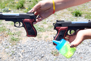 Police respond to calls of two boys pointing pistols.