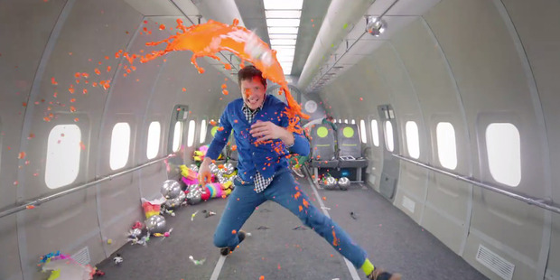 A scene from OK Go's new music video for their song Upside Down & Inside Out.