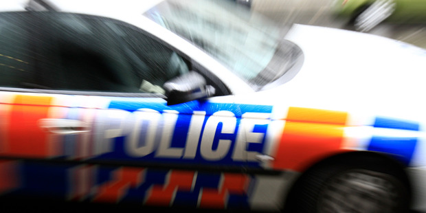 Police are diverting traffic from the scene of a truck-and-trailer crash on State Highway 2 in western Bay of Plenty. Photo / Martin Sykes