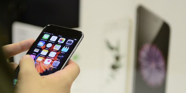 Thousands of iPhone users are complaining that their device has been rendered useless by Apple's latest updates. Photo / Getty Images
