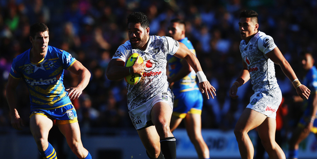 Konrad Hurrell of the Warriors makes a break during the 2016 Auckland Nines. Photo / Getty Images
