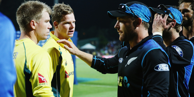 Steve Smith of Australia and David Warner of Australia shake hands with Brendon McCullum of the Black Caps after losing the 3rd One Day International. Photo / Getty Images.