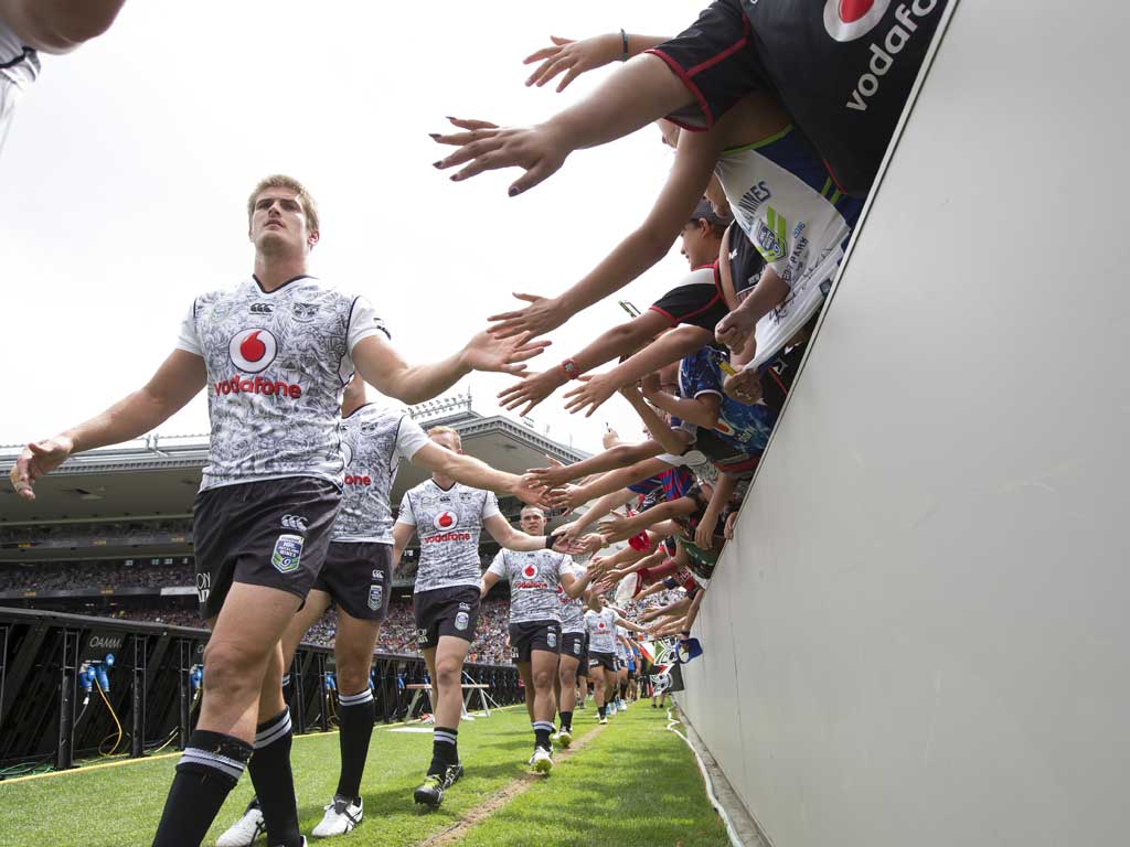 The Warriors make their way out onto the field for the semi-final. Photo / Brett Phibbs.