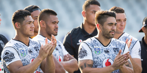 New Zealand Warriors Roger Tuivasa-Sheck and Shaun Johnson congratulates the Parramatta Eels in the Final of the NRL Nines at Eden Park. Photo / Brett Phibbs.
