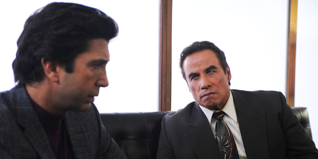 David Schwimmer as Robert Kardashian, John Travolta as Robert Shapiro.