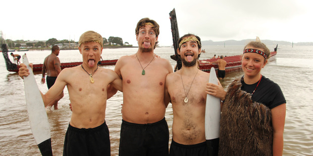 Dutch kaihoe (paddlers), from left, Diederik Thompson, Thomas Driessen, Alex Miesen and Mirte Hazes during Waitangi Day commemorations on Tii Beach. PHOTO / PETER DE GRAAF