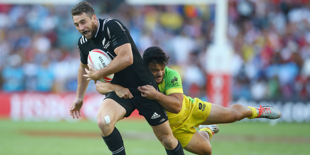 Joe Webber of NZ is tackled by Allan Fa'alava'au of Australia. Photo / Getty Images