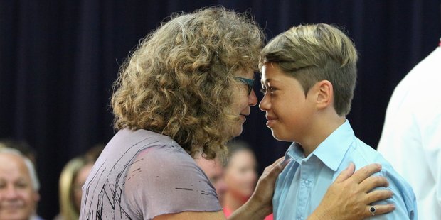 Kuranui College Te Reo Maori teacher Suzanne Murphy welcomes new Year 9 student Koby McCarthy during a powhiri to welcome the fresh crop of students to the school. Photo / Catherine Rossiter-Stead