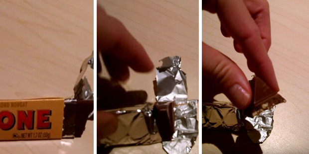 It turns out there is a much easier way to break off a piece of Toblerone. Photo / YouTube, Kaitlin Moore
