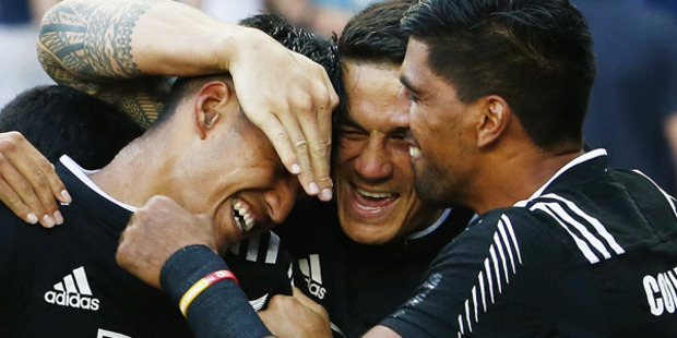 Rieko Ioane of New Zealand (L) is congratulated by teammate Sonny Bill Williams (C) after scoring the final try to win the 2016 Sydney Sevens final match. Photo / Getty Images