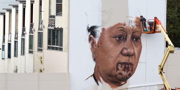 Hine, a portrait by Owen Dippie of his friend Tania, is on the side of an Upper Queen St building. Photo / Brett Phibbs